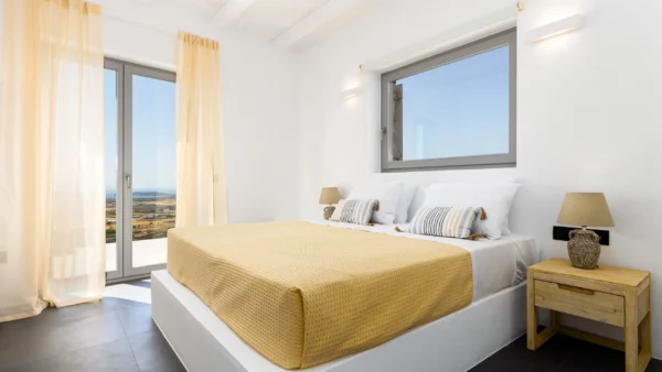 Espace nuit avec une chambre élégante à Chiara di Luna - Location de villa de vacances -Paros