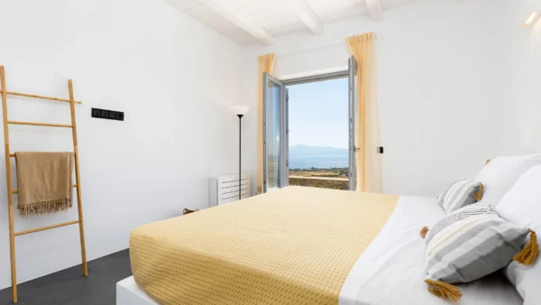 Espace nuit avec une chambre élégante à Chiara di Luna - Location de villa de vacances -Paros